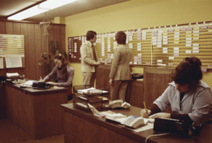 People working in 1970s office
