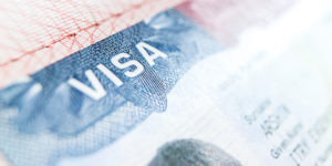 Visa stamp in U.S. Passport with blurry background
