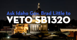 Light on the capital down at night over Boise Idaho, with words transposed as follows "Ask Idaho Gov. Brad Little to VETO SB1320"